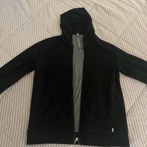 Vuori black zip up hoodie. Size Medium
